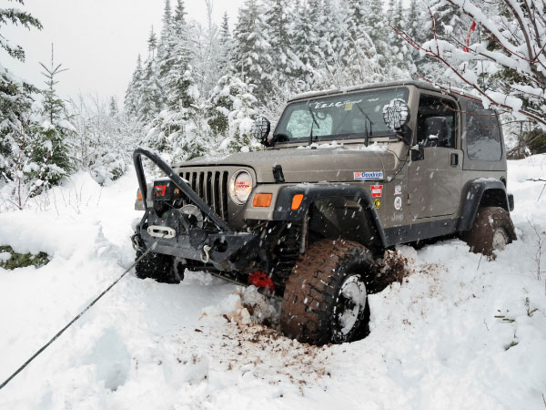 new updated model of 4 wd Jeep Wrangler in terrain conditions