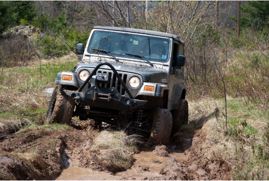 Jeep Off-Road on Muddy Trail