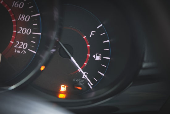 Low Fuel gauge showing fuel dashboard