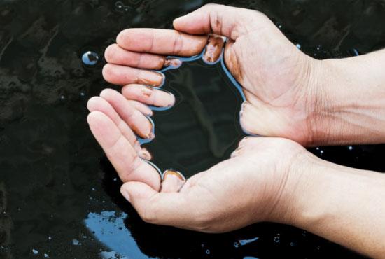 crude in hand due to oil leak