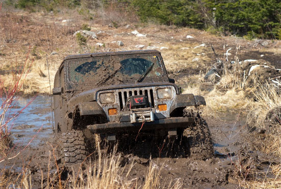 Jeep in the Mud after installing locker