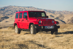 Red Jeep Wrangler Suv on Outdoors